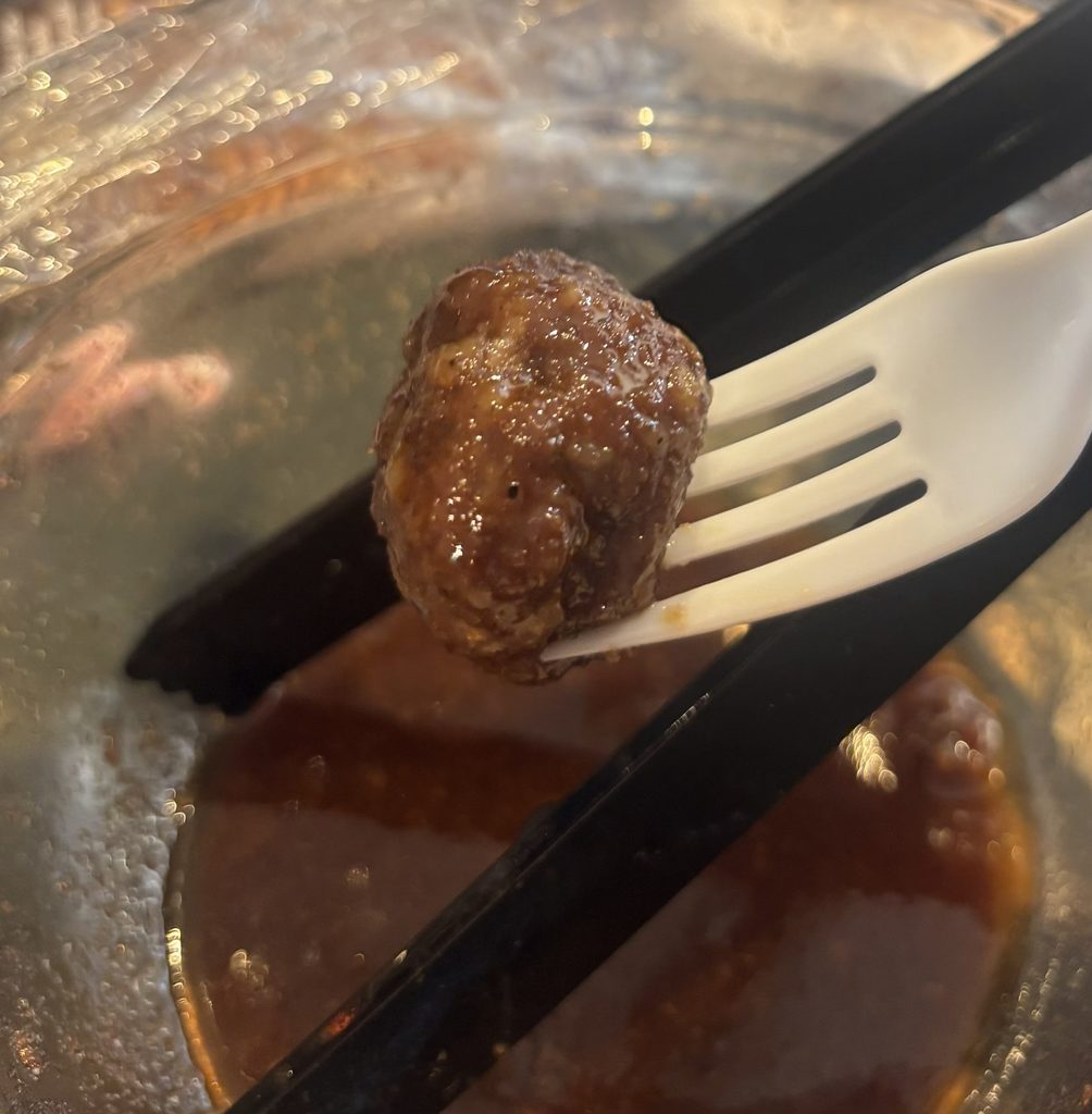 sausage on fork